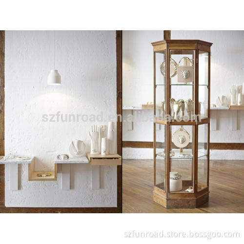 Wooden tower displays and jade glass cases for brand jewelry store display solutions